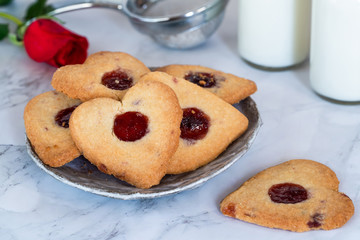 Shortbread hearts with cherry jam. Valentine food idea.