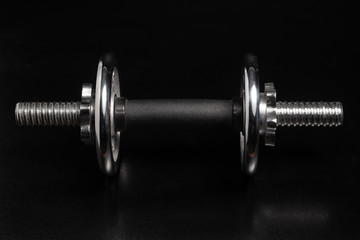Dumbbell on Black Background