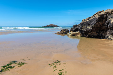 French landscape - Bretagne. A beautiful beach with rocks at low tide.