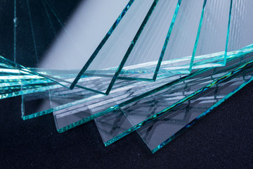 Sheets of Factory manufacturing tempered clear float glass panels cut to size - 245159616