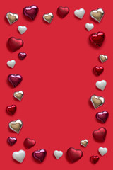 Heart shape ornament pattern on red background. Copy space image.