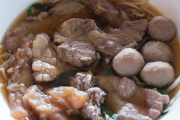 Close up of Braised beef and meat clear soup.