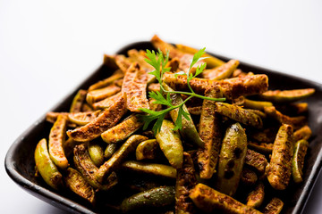 Tindora Sabzi / Tendli / tondli Fry also known as Ivy Gourd fry recipe. selective focus