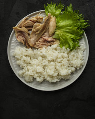 rice and boiled chicken meat. proper nutrition. food background. copy space