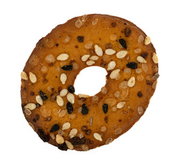 Single bite size bagel chip with seeds on a white background