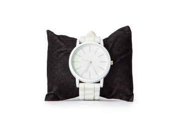 Wrist watch on pillow