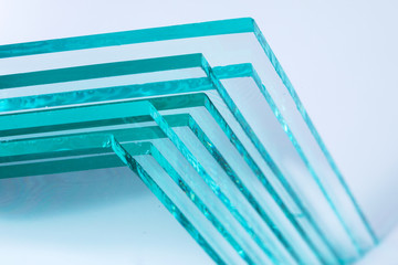 Sheets of Factory manufacturing tempered clear float glass panels cut to size - 245169257