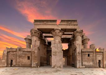 Ruins of the Temple of Kom Ombo in the Nile river at sunset, Egypt