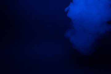 Colorful smoke close-up on a black background