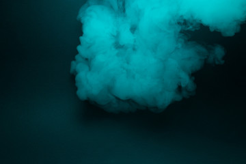 Colorful smoke close-up on a black background