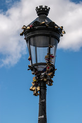 Fototapeta na wymiar Locks on a street lamp