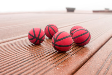 Wet basketballs on the street