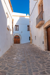 Fototapeta na wymiar Ibiza, Spain, beautiful ancient door of Eivissa city, typical street in the village 