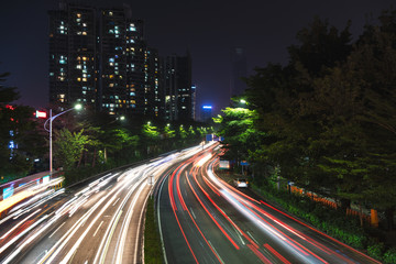 Fototapeta na wymiar Night traffic, rapid development