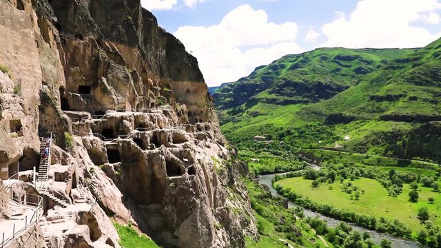 Timelapse view of the highland valley with clouds from the height of the Mount. Vardzia monastery complex. Georgia.