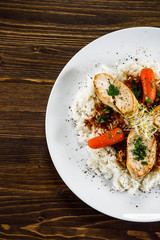 Chicken meat with rice and vegetables