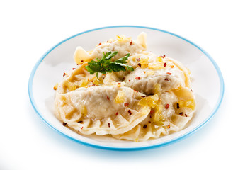 Dumplings - stuffed cheese noodles on white background