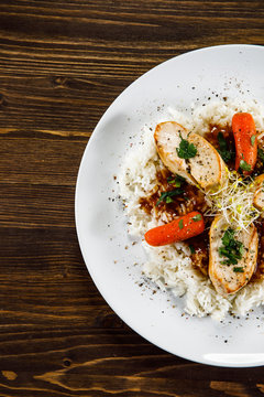 Chicken meat with rice and vegetables