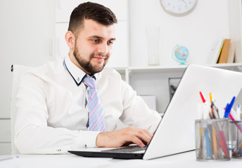Fototapeta premium Man working productively