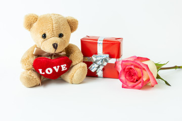 Teddy bear, present and roses for valentine's day