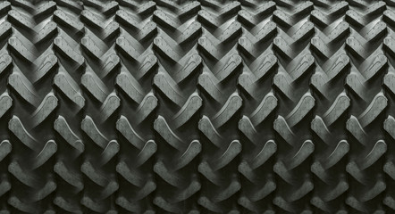 Texture made of tractor tires. Montage. Seems like a compressor roller. Tire background.