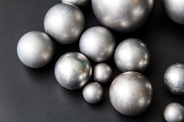 Metal hardware on a black background