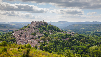 Fototapeta na wymiar The medieval walled town of Cordes-sur-Ciel built on a mountain