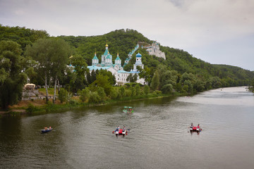 Boats on the Seversky Donets river, Holy Mountains and Sviatogorskaya Lavra at Sviatogorsk.