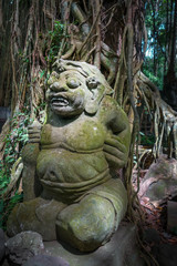 Fototapeta na wymiar Statue in the Monkey Forest, Ubud, Bali, Indonesia