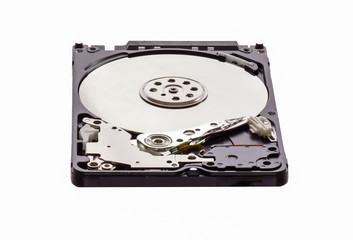 Opened disassembled hard drive from the computer, hdd with mirror effect. Isolated on white...