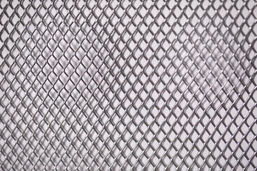 square grid on white wall metal background close-up