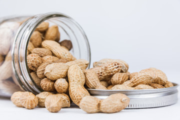 Peanuts Spilling From A Jar