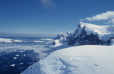 Fototapeta na wymiar Antarctica; with a helicopter flying over the landscape