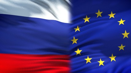 Russia and European Union flags background, diplomatic and economic relations