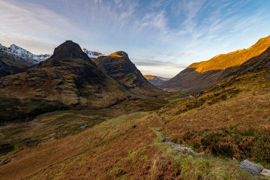 Hiking trail in mountain scenery with peaks of Stob Coire nan Lochan, Glen Coe, west Highlands, Scotland, United Kingdom, Europe