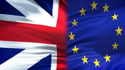 Great Britain and EU flags background, diplomatic and economic relations, trade