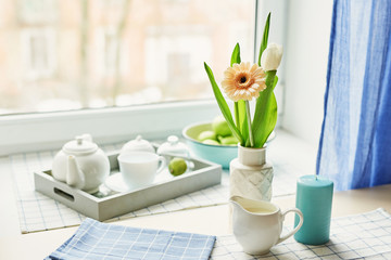 Spring card template. Happy Birthday or Valentine. Women's Day. Greeting card for mother's day. Congratulation with flowers. Flower card. Copy space. Wedding invitation.Tea set with flowers and sweet