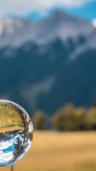 Smartphone HD wallpaper of crystal ball alpine landscape shot at Achensee - Pertisau - Tyrol - Austria