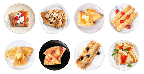 Set of plates with tasty thin pancakes and different toppings on white background, top view