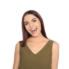 Portrait of young woman laughing on white background