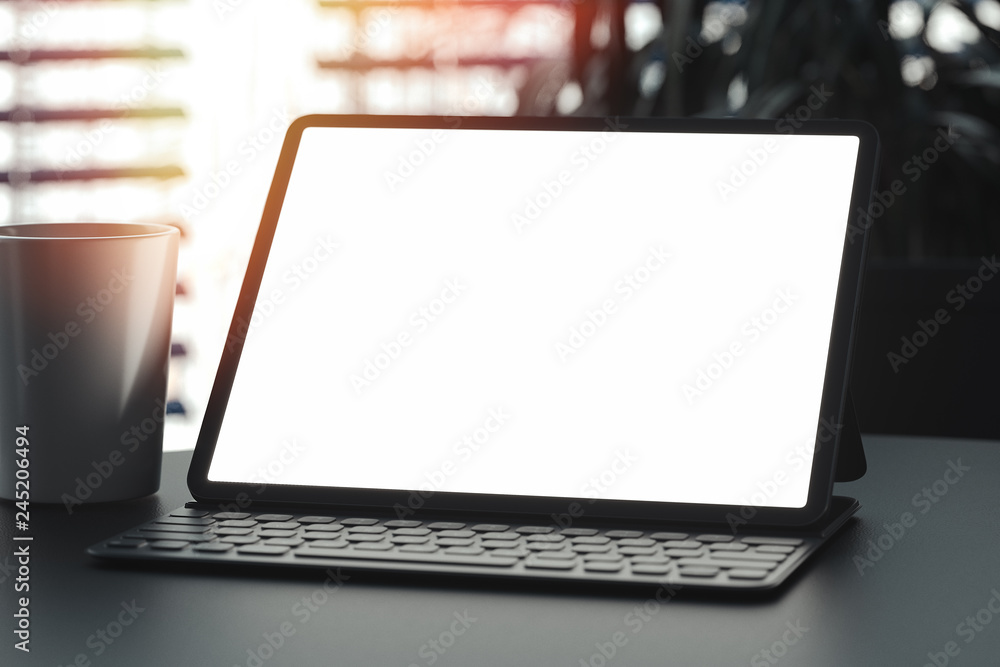 Poster tablet with blank white screen and keyboard on table. workspace. 3d rendering.
