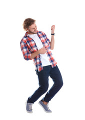 Fototapeta premium Young man playing air guitar on white background