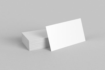 Blank white business card mockup display isolated on grey background
