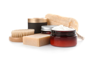 Different body care products and accessories on white background