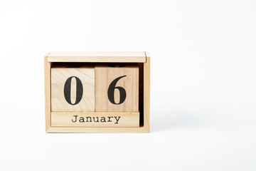Wooden calendar January 06 on a white background