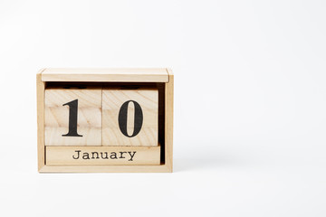 Wooden calendar January 10 on a white background