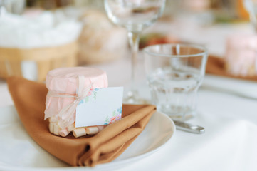 Marshmallow in the jar on the table.