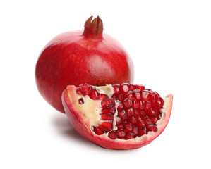 Ripe pomegranates on white background. Delicious fruits