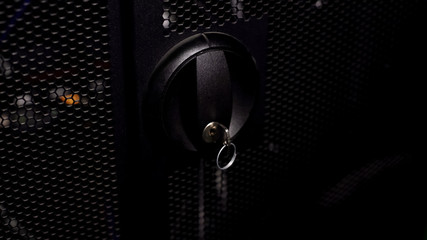 Closed door with key to computer server racks or switch box, security system