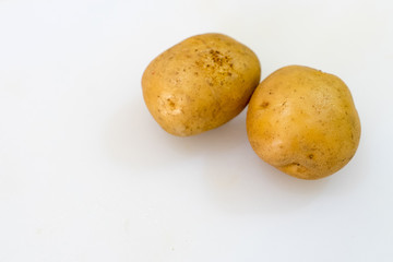 Potato. Raw fresh organic potato isolated on a white background with copy space.